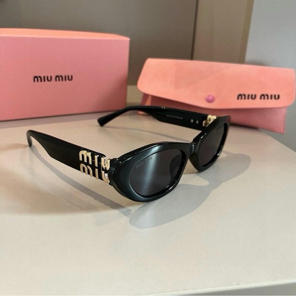 Miu Miu Black and Gold Sunglasses